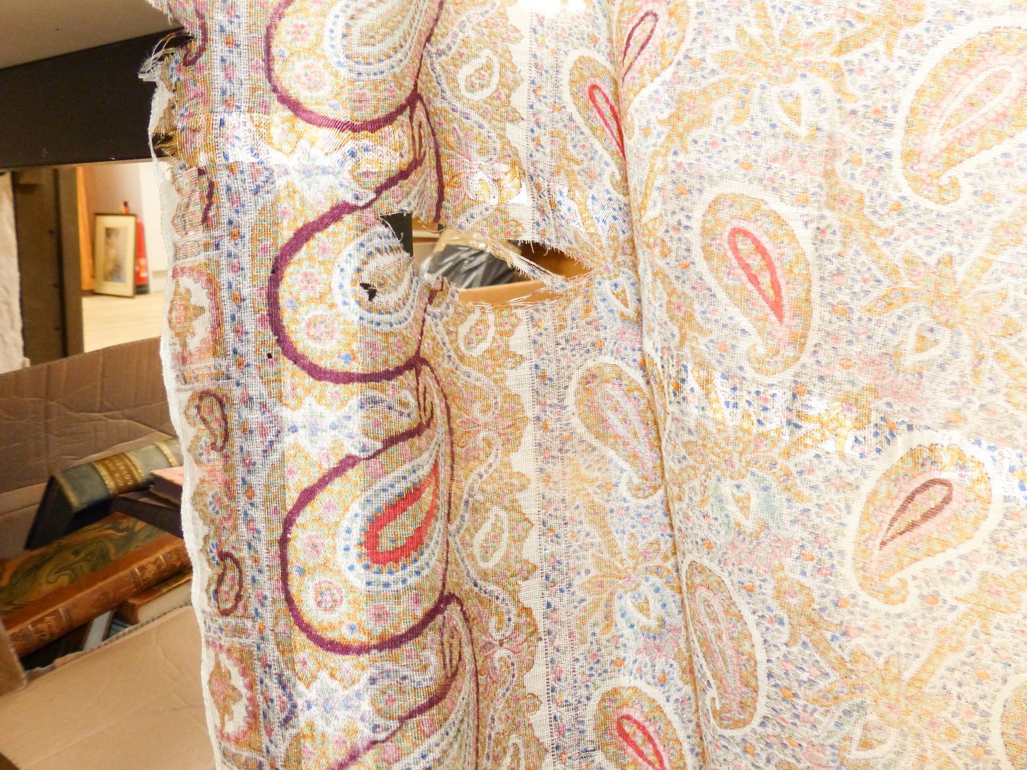 A Paisley pattern silk shaw (damaged) together with two Kelim woven bags (3)